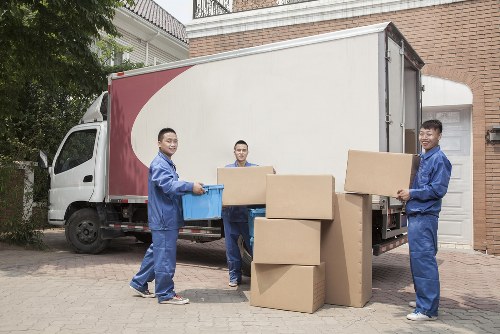 Man and van service vehicle loaded with household items for transport