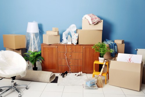 Packed office furniture and equipment prepared for relocation