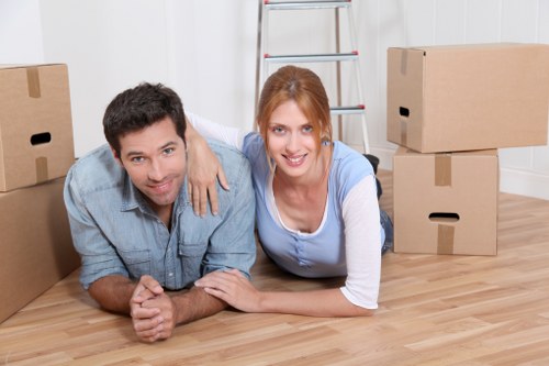 Mover wearing PPE while carrying items during a Crystal Palace removals job